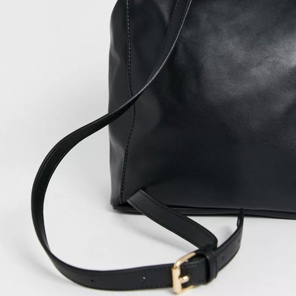 ASOS DESIGN slouchy backpack with oversized pocket - Picture 3 of 8